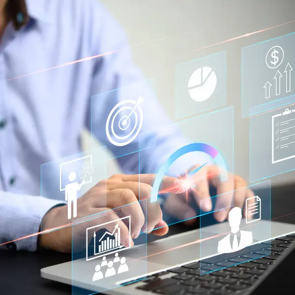 Reporting on marketing campaign results - image of man at computer with charts and graphs